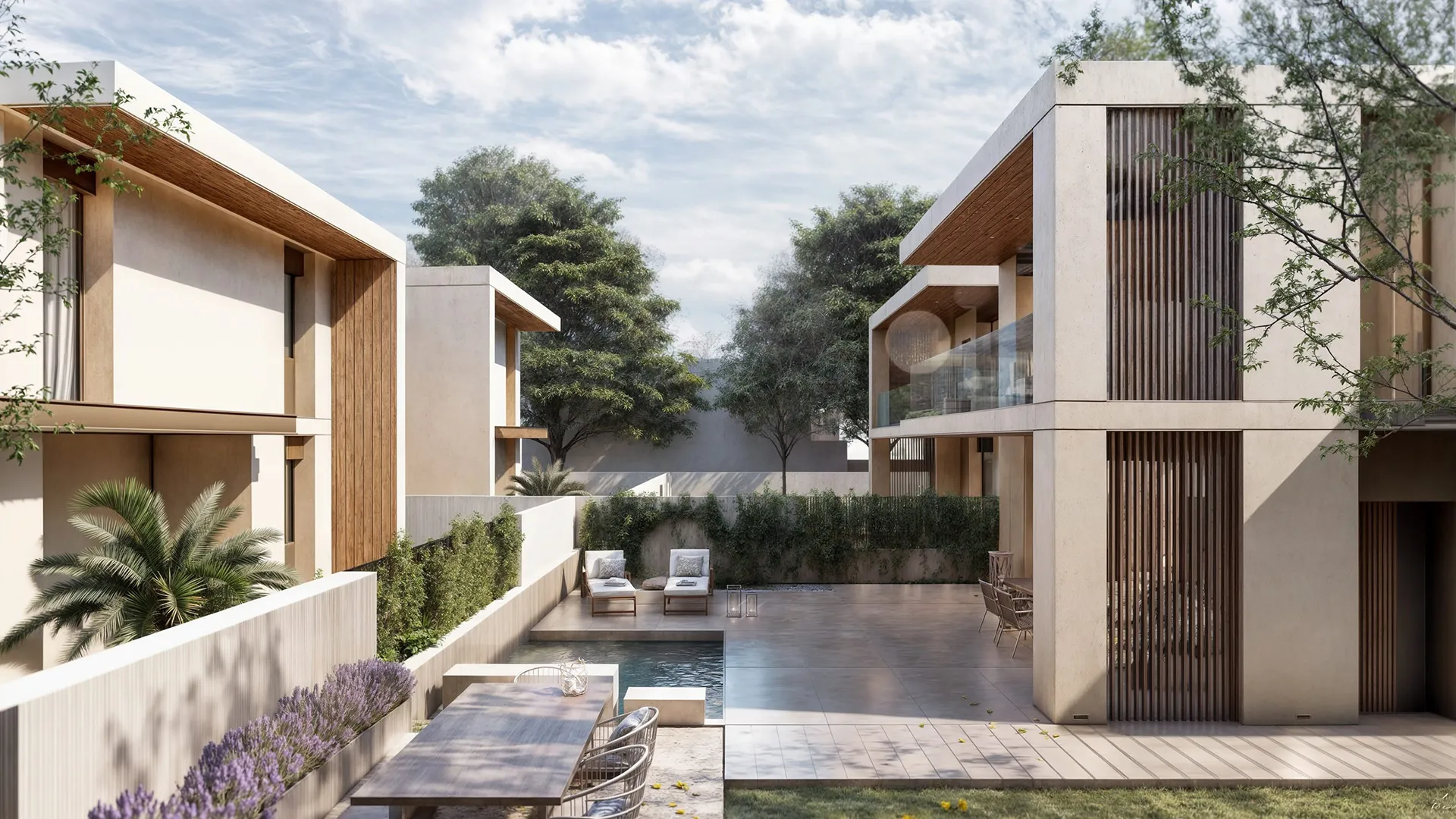 Modern homes with outdoor pool, patio furniture, greenery, and trees under a partly cloudy sky.